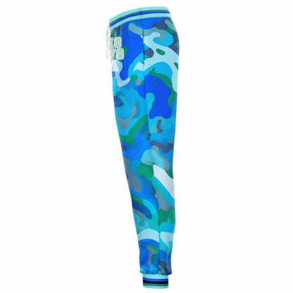 Joggers unisex de poliéster ecológico 1976 de camuflaje azul Motion of the Ocean 