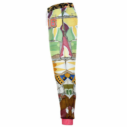 Joggers unisex de poliéster ecológico con mosaico floral de sabana africana rosa 