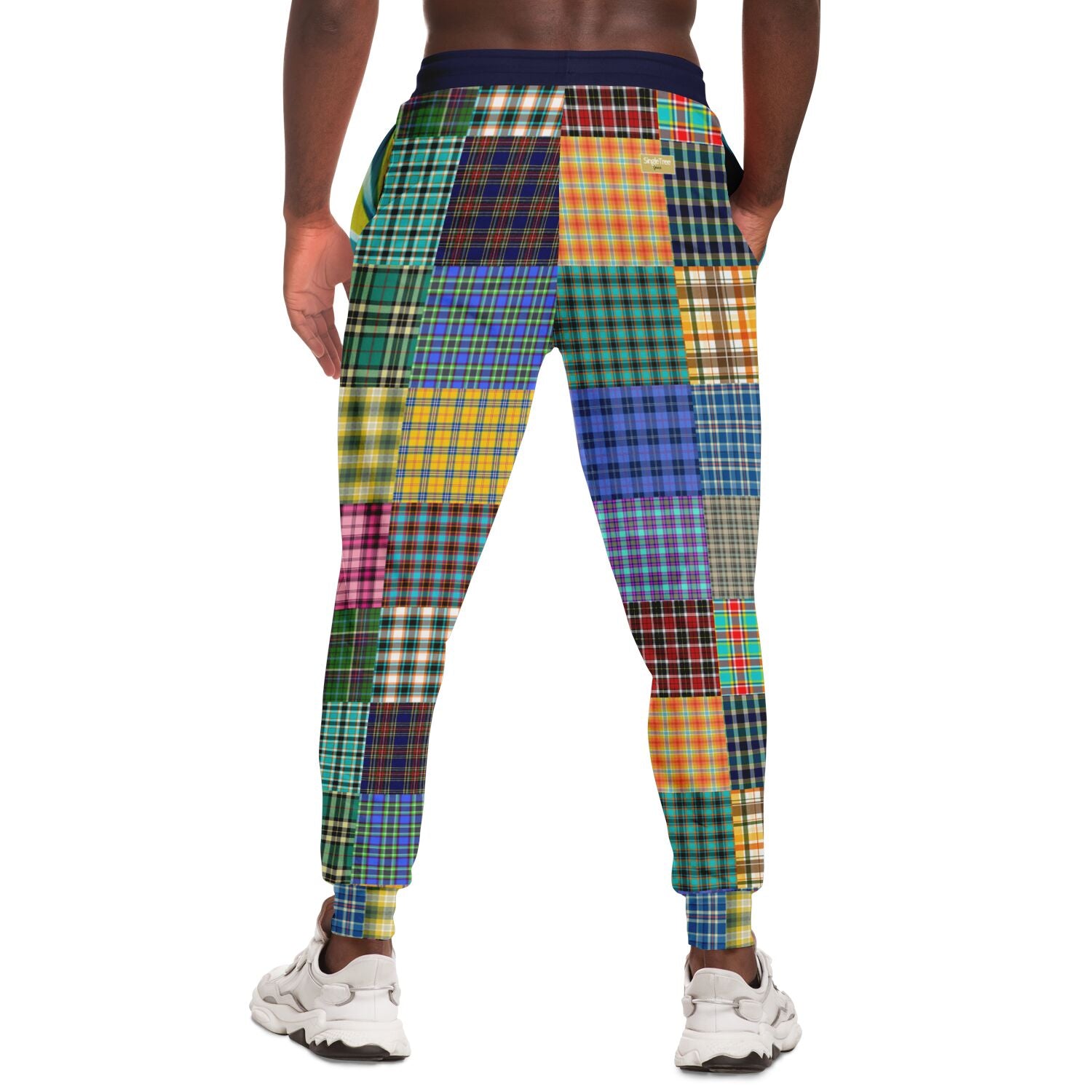 Joggers unisex de poliéster ecológico con patchwork a cuadros Woodsman de The Preppy 