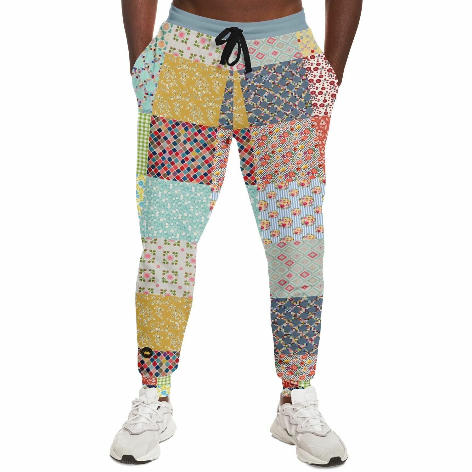 Joggers unisex de eco-poliéster con patchwork floral azul 