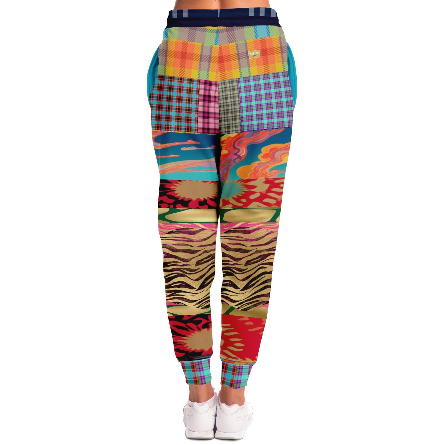 Walking the Runway Joggers unisex de eco-poliéster con patchwork de cebra