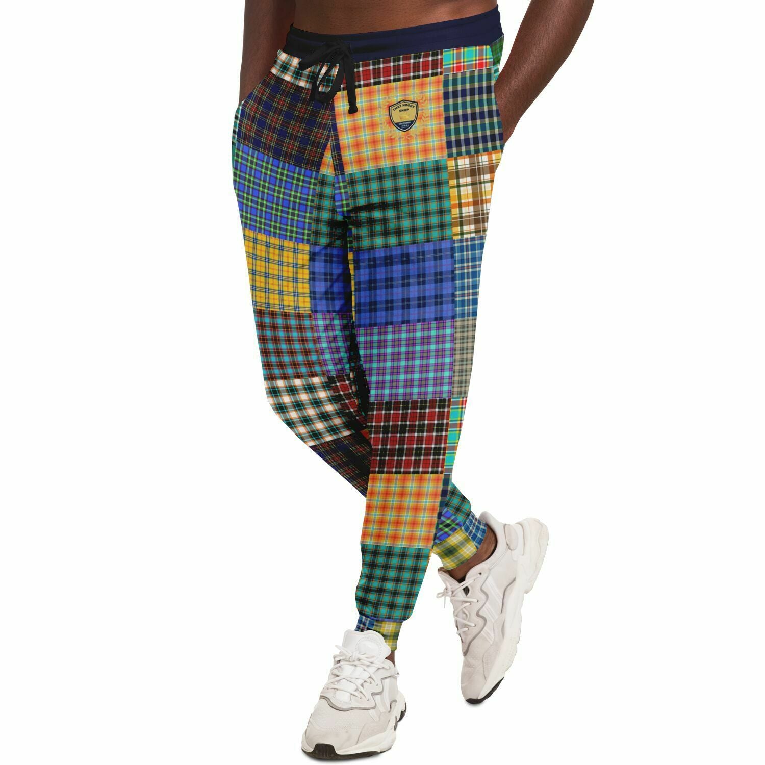 Joggers unisex de poliéster ecológico con patchwork a cuadros Woodsman de The Preppy 