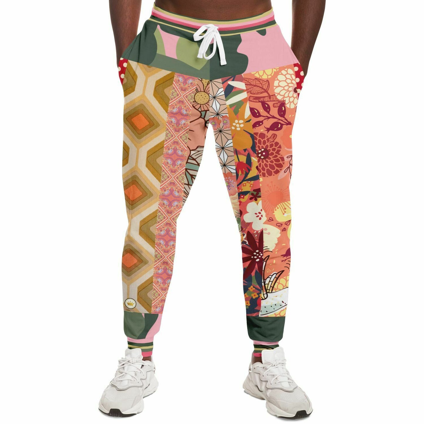 Joggers unisex de poliéster ecológico con patchwork floral rosa de Yogananda