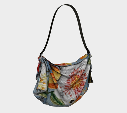 Bolso estilo hobo tipo bufanda con estampado de plumas y denim de Free Spirit