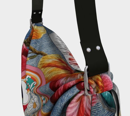 Bolso estilo hobo tipo bufanda con estampado de plumas y denim de Free Spirit